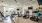 Open fitness center with warm, recessed lighting and a variety of equipment